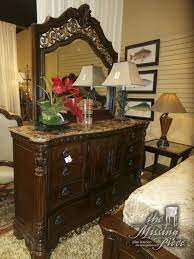 Gorgeously Styled Rooms To Go Handly Manor Dresser And Mirror With Marble Top And A Band Of Decorative Cas Rooms To Go Rooms To Go Bedroom Dresser With Mirror