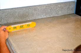 Sponge some water on the surface of the countertop to completely wet it. Concrete Counters Sand Seal Wax Diy Concrete Counter Diy Concrete Countertops Concrete Diy