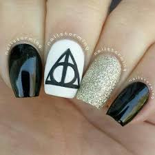 15 Magic Harry Potter Nail Designs Pretty Designs Harry Potter Nail Art Harry Potter Nails Designs Nail Art I love the series and wanted to do an updated manicure design!