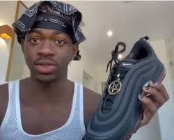 Lil nas x teamed up with mschf to release a new athletic nike shoe (air max 97 custom) dedicated to satan complete with a pentagram and a drop of human blood in each shoe. Dlisted Lil Nas X Continues To Stunt With His Satan Shoe Which Contains A Drop Of Human Blood
