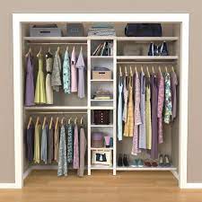 I used a pile system: Closetmaid Impressions Basic 48 In W 112 In W White Wood Closet System 53016 The Home Depot
