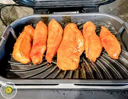 In a bowl mix together oil, soy sauce, balsamic vinegar, brown sugar, worcestershire, garlic & salt & pepper. Ninja Foodi Grill Spicy Honey Garlic Chicken The Tasty Travelers