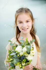Check spelling or type a new query. Adorable Little Bridesmaid Holding Beautiful Flower Bouquets After Wedding Cemerony Outdoors Destination Wedding On Cephalonia Island On Greece Stock Photo Picture And Royalty Free Image Image 119882380