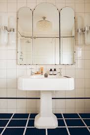 Hiden secret slide bathroom door is the most elegant and modern of bathroom door ideas. Libertyn Interiors