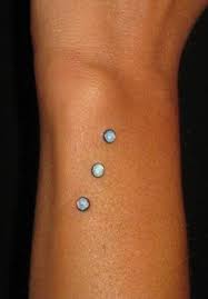 Dermal Piercing Nose Ear Piercings In 2020 Wrist Piercing Dermal Piercing Chest Piercing