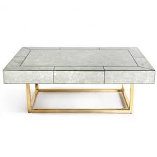 Covered in antiqued mirrored veneers. Amelie Mirrored Coffee Table Neiman Marcus