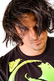 Sexy boy with long hair indonesian young man with a sexy