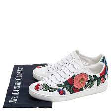 Treaded rubber outsole in tan. Gucci White Leather Floral Embroidered Ace Sneakers Size 34 Gucci Tlc