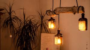 Lampe Aus Treibholz Und Alten Gin Flaschen Monkey 47 Mit Bildern Treibholz Lampe Diy Lampen Lampe Aus Flaschen