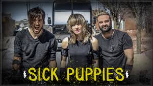 It's been a long time comin' and the tables' turned around 'cause one of us is goin' one of us is goin' down. Sick Puppies 105 7 The Point
