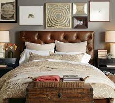 Dark wood frfame bed for a modern masculine bedroom. Lorraine Tufted Leather Low Bed Leather Bed Headboard Bedroom Decor Inspiration Leather Bedroom