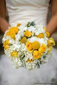 Bride S Bouquet Comprised Of White Hydrangea Yellow Craspedia Yellow Spray Roses Dusty Miller Snowberry Yellow Bridal Bouquets Freesia Bouquet Bouquet