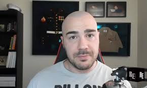 Angelo John Gage Spreads Hate with a Twitter Blue-Check