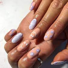 Smiley Face Manicures Are 2021 S Biggest Nail Trend She had three nails painted in black polish and decorated with studs, spirals and smiley faces, one purple nail and a pink one with. smiley face manicures are 2021 s