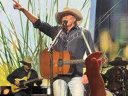 My mom gave me this picture she took of Alan Jackson in concert in 1996, figured yall would like it : r/CountryMusicStuff