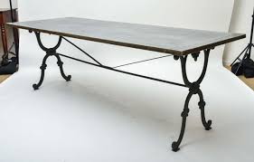 Dining tables are hot spots even when there's no food on them. 19th Century Cast Iron Base Writing Or Dining Table With New Antiqued Zinc Top At 1stdibs