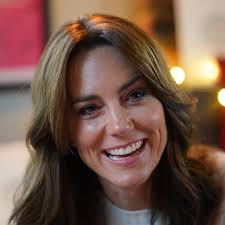 Kate Middleton radieuse aux côtés d'un groupe de "super-papas"