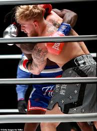 Floyd mayweather reacted furiously after jake paul stole his baseball cap at the media event to promote the boxing legend's exhibition bout against the after a heated exchange of words, jake paul ripped off mayweather's baseball cap, and the pair clashed angrily in front of the watching media. Jake Paul Dominates Nate Robinson With Vicious Ko In Undercard Match At Mike Tyson Vs Roy Jones Jr Daily Mail Online