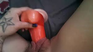 xxxtra small inked up slut fucks herself with big hellboy dildo