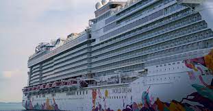 People are seen on board the dream cruises' world dream cruise ship docked at the marina bay cruise center in singapore on wednesday. In Singapore A Cruise To Nowhere On The World Dream The New York Times