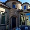 Providing great curb appeal, desert style front yard, 3 car. 1