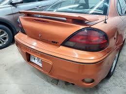 Image result for Red Brown 2004 Pontiac