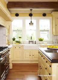 Living room has pine coffee tables, stone colored sofa, charcoal/black/cobalt pillows. 40 Colorful Kitchen Cabinets To Add A Spark To Your Home