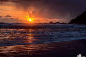 Check out our oregon sunset photos selection for the very best in unique or custom, handmade pieces from our shops. Rain Falls On The Waves During A Sunset On The Oregon Coast Cannon Beach Oregon United States Of America Pacificstock