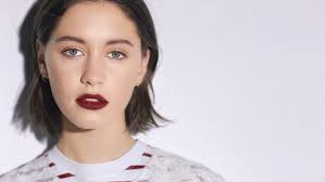 Iris Law displays her sartorial flair in shimmery shirt dress at Coach's  NYFW show