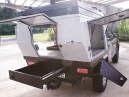 Susan owned a popup camper and all it had was a cassette toilet and no shower! This Pop Up Camper Transforms Any Truck Into A Tiny Mobile Home In Seconds