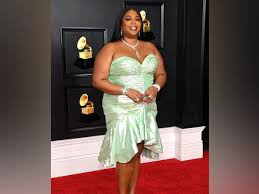 The music video establishes the two as greek muses, goddesses of the arts. Lizzo Rocks A Seafoam Green Dress At 2021 Grammys