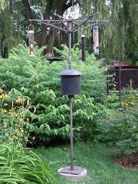 How To Build A Bird Feeder Pole Bird Feeder Poles Bird Feeders Bird House Kits