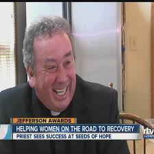 Father Glenn O'Connor plants Seeds of Hope