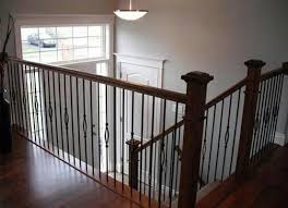 I can't believe how big of a difference such a small space makes now that it's all done and functional and. Metal And Wood Railing On A 7 Up 7 Down Bi Level Home Banister Remodel Updating House