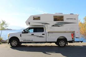 Though some campers may very likely already have everything unpacked and set up around camp, i'm the kind of person who leaves at least a cooler and a bag or two floating around while camping. Long Bed Truck Campers Northern Lite 4 Season Truck Campers
