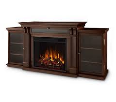 The electric fireplace, which sits in the center the stand, measures 18.1 inches high, 23.8 inches wide and 18 inches deep. Real Flame Calie Electric Fireplace Entertainment Center Qvc Com