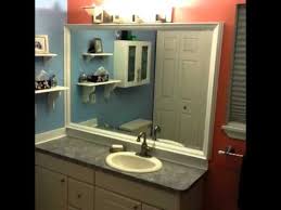 Be generous with the glue. Diy Custom Bathroom Mirror Frame With Backsplash Using Crown Molding Youtube