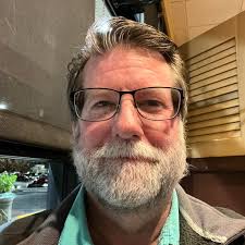 What is the best mid-range metal detector for humid, salty conditions?