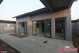 china 3d printed house makes debut in shandong province phase one of ongoing project 3dprint com the voice of 3d printing additive manufacturing 3d printed house 3d printed building concrete house