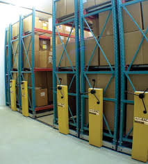 You Can Easily Reclaim Your Warehouse Storage Space By Making Your Static Racks And Shelves Move The Carriage And Rail Industrial Racks Storage Spaces Storage