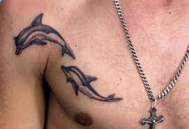 They interpreted the presence of dolphins riding in a ship's wake as a very good omen. Dolphin Men Tattoos Blogbois