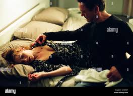 KISS, KISS, BANG, BANG USA 2005 Shane Black Harmony (MICHELLE MONAGHAN) and  Harry (ROBERT DOWNEY JR.) Regie: Shane Black Stock Photo - Alamy