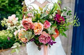Florists and event designers are using brightly colored spray paints to amp up otherwise ordinary blooms and arrangements, giving them an added burst of whimsy and flair. Wedding Bouquet 7 Romantic Ideas For Summer Combermere Abbey