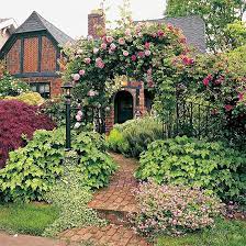 Tudor Style Home Ideas That Bring Old World Style Into The Modern Age Tudor Style Home English Cottage Garden Cottage Garden