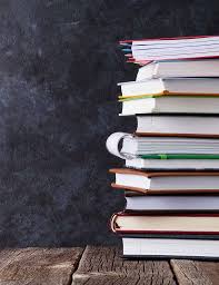 notepads on table in front of chalkboard for children backdrop book wallpaper book background powerpoint background design