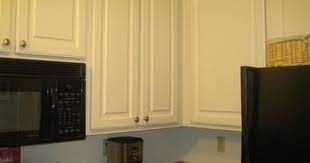 How To Make Stained Kitchen Cabinets Look Shiny Again Stained Kitchen Cabinets Clean Kitchen Cabinets Kitchen Cabinets