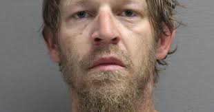 Man facing charges for shooting gun inside house with friends and family  present