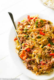 Thinly slice corned beef against the grain and serve with potatoes, carrots and cabbage, garnished with mustard and parsley, if desired. Caribbean Corn Beef And Cabbage Immaculate Bites