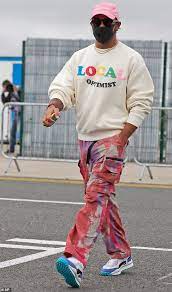 He just drives cars bloody fast. Lewis Hamilton Stands Out In A Vibrant Outfit Ahead Of The Grand Prix Readsector