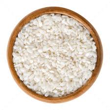 Arborio Risotto Rice In Wooden Bowl Over White Risotto Rice Edible Food Arborio Rice